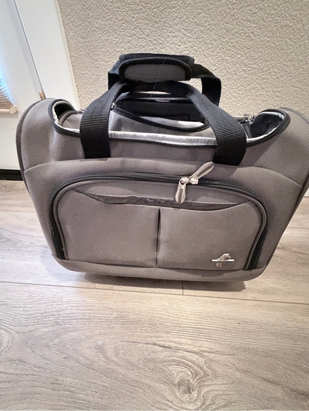 Travel Bag - Compact Carry-On Laptop Case- with roller handle.